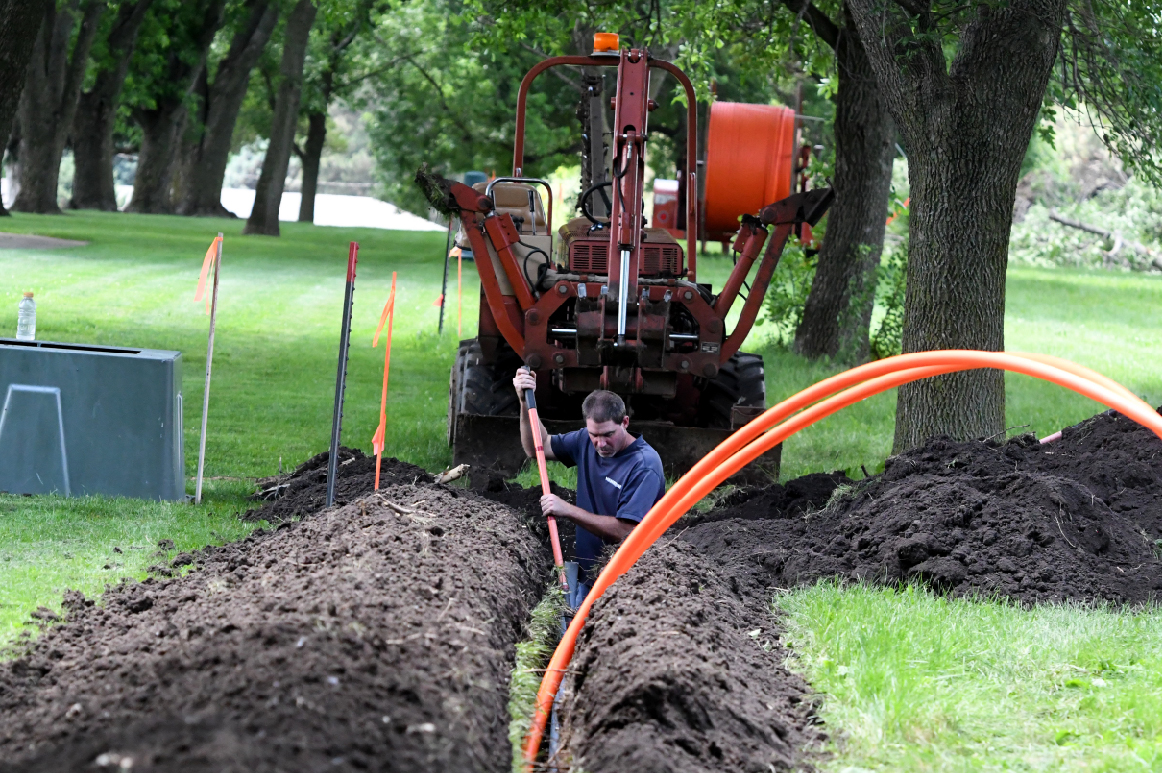 Hamilton Fiber crew burring fiber